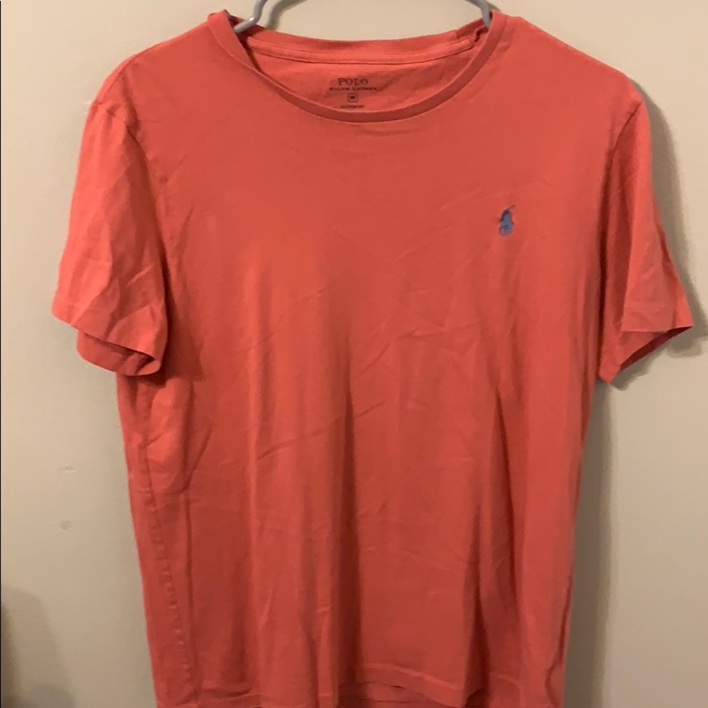 Salmon pink polo shirt